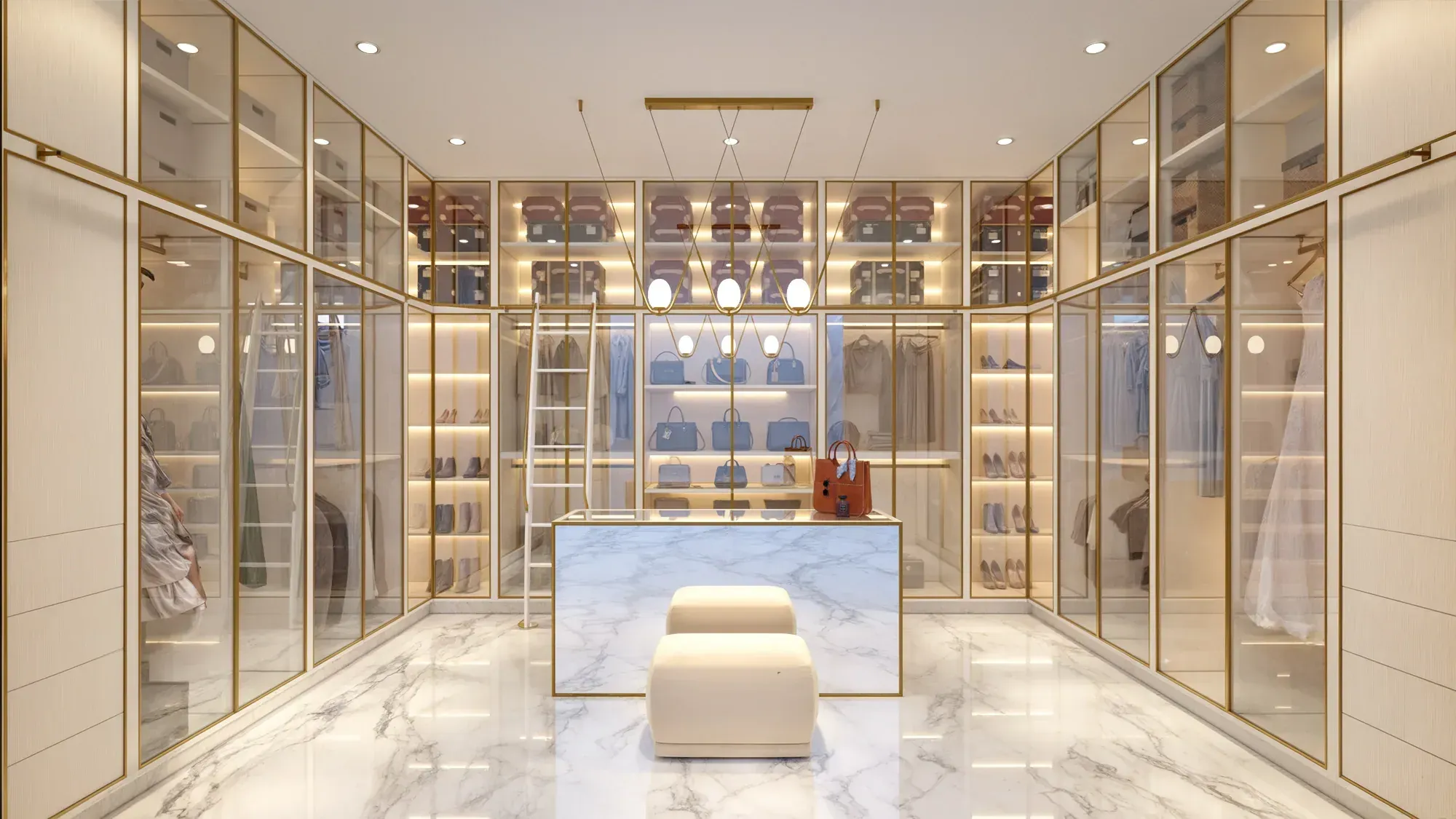 Walk-in dressing room at the Balla Residence in Doral, Florida, with brass framed glass cabinetry and a central marble island