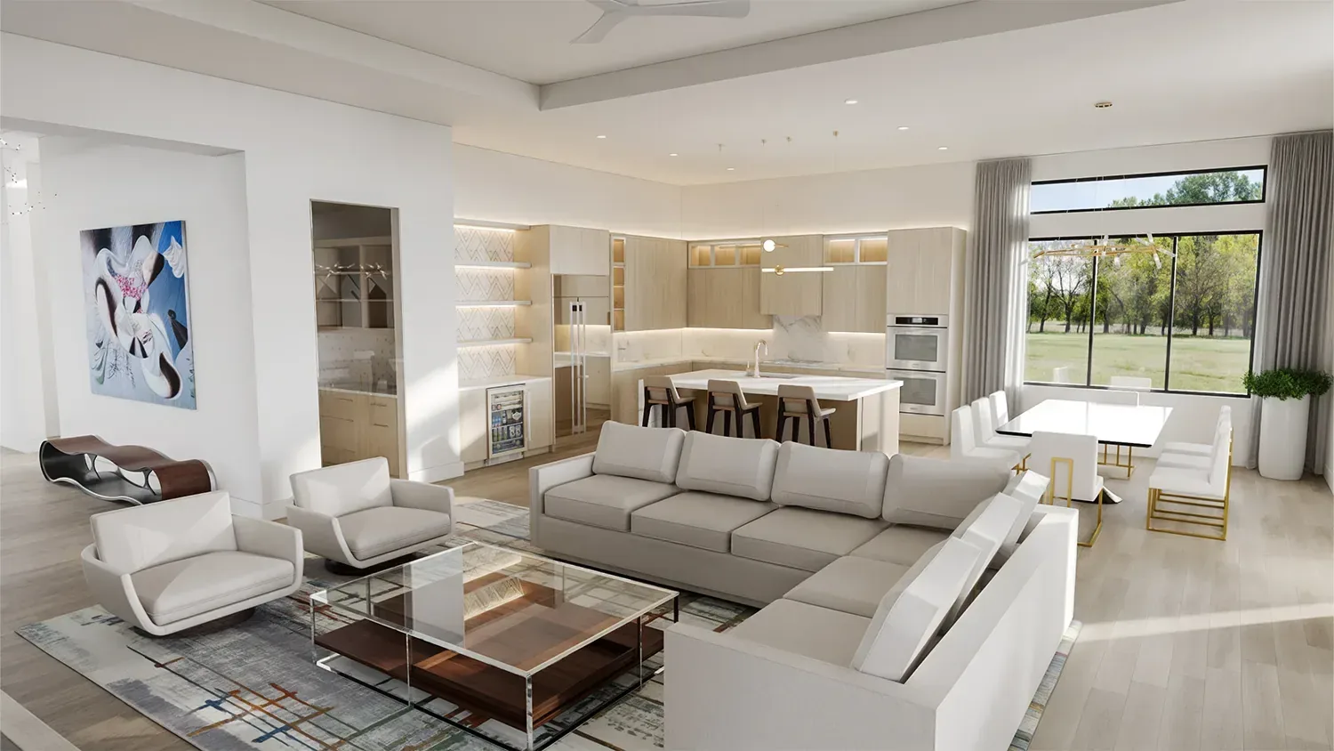 Open living and kitchen area at the Shubert Residence in Boynton Beach, Florida, with a grey sectional and glass coffee table